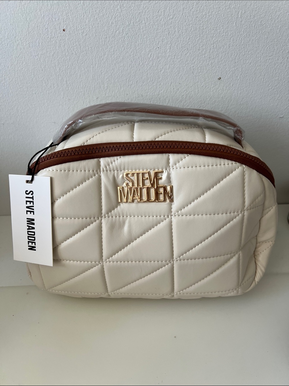 Steve Madden Cream Quilted Cosmetic Case with Brown Trim